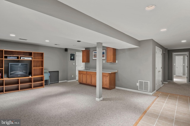 basement with light carpet