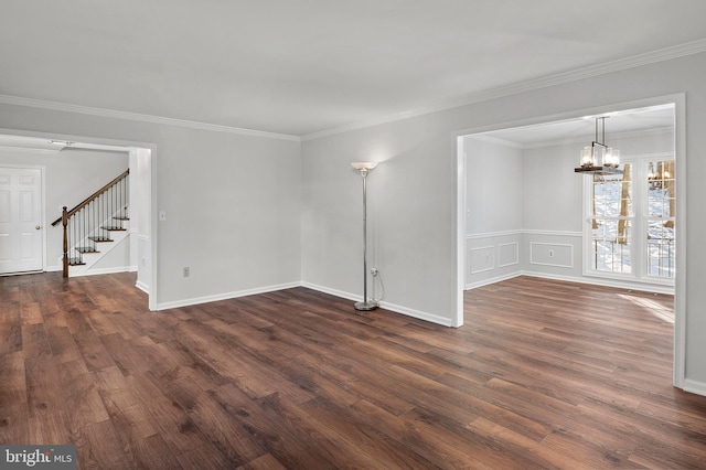 interior space featuring ornamental molding and a chandelier