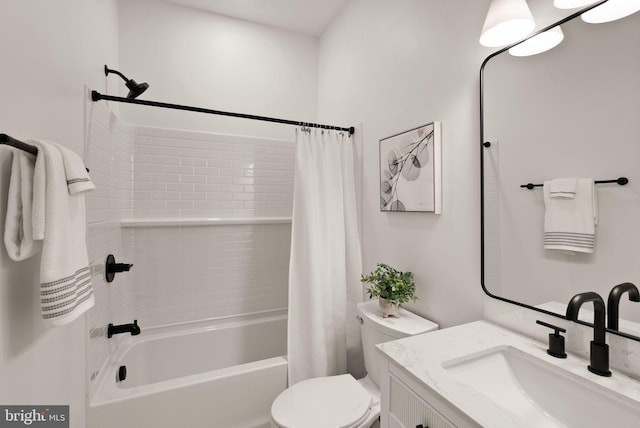 full bathroom featuring vanity, toilet, and shower / bath combo