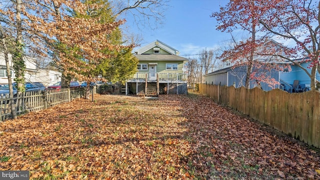 view of yard featuring a wooden deck