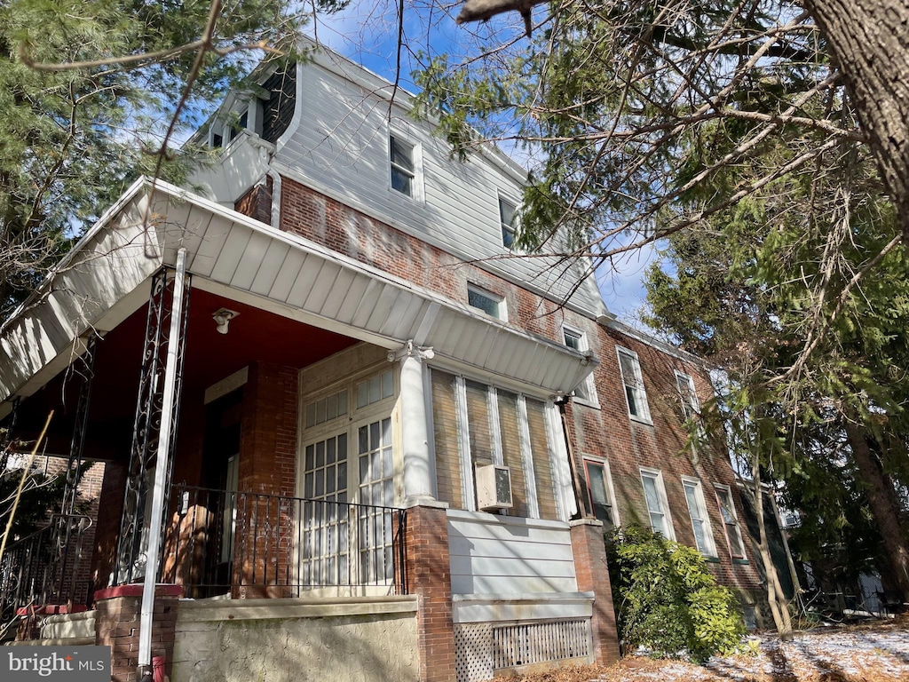 view of home's exterior featuring a porch