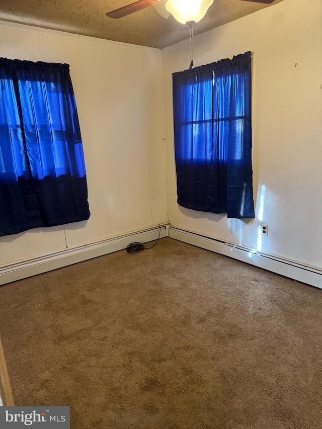 carpeted empty room with ceiling fan