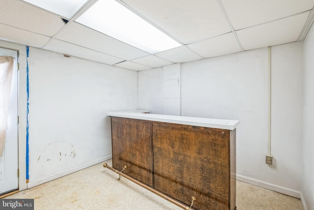 bar featuring a drop ceiling