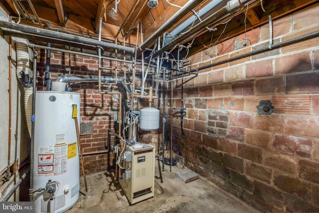 utility room featuring gas water heater