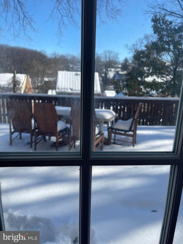 view of snow covered deck