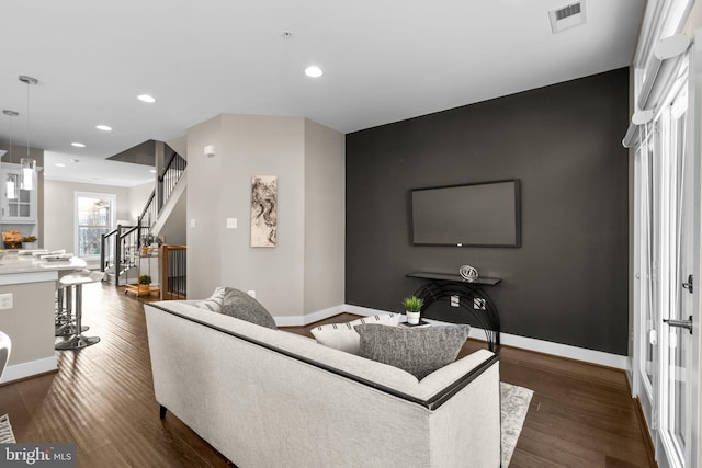 living room featuring dark hardwood / wood-style floors