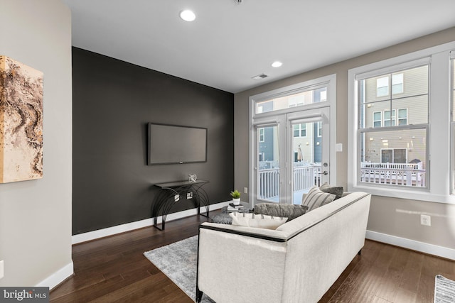 living room featuring dark hardwood / wood-style floors