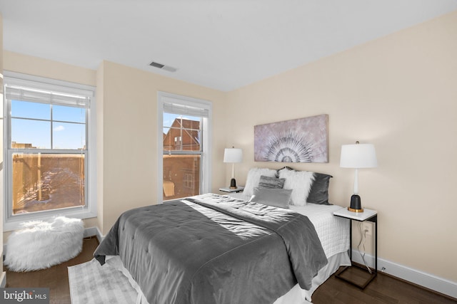 bedroom featuring hardwood / wood-style flooring