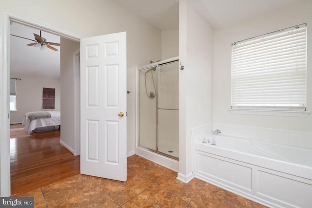 bathroom with tile patterned flooring, ceiling fan, plenty of natural light, and shower with separate bathtub