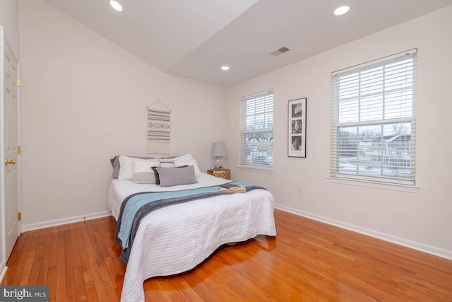 bedroom featuring hardwood / wood-style floors