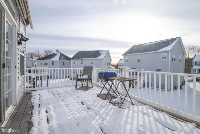 view of snow covered deck