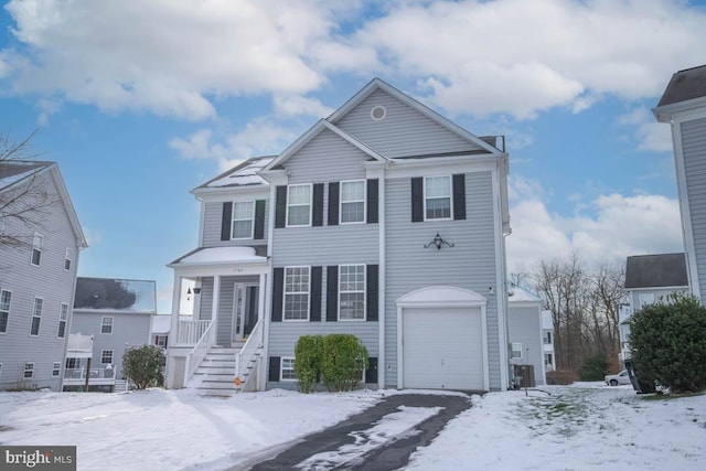 view of front of property featuring a garage