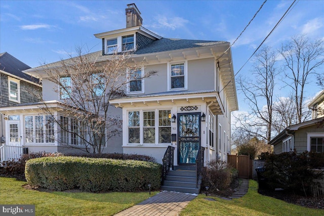 italianate home with a front yard