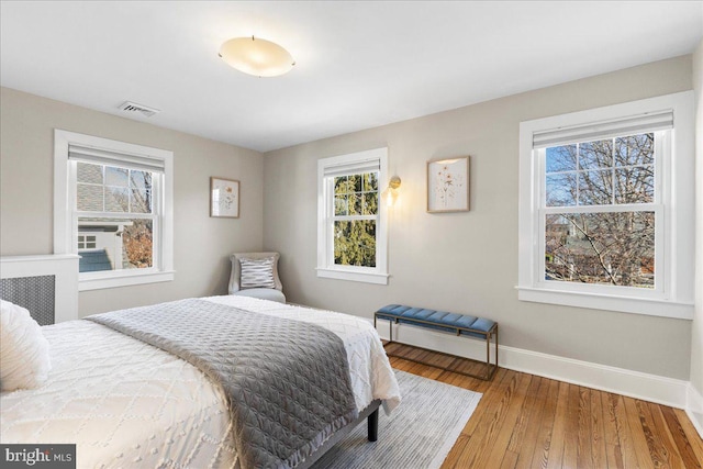 bedroom featuring hardwood / wood-style flooring