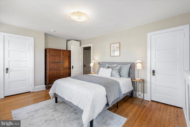 bedroom featuring light hardwood / wood-style floors