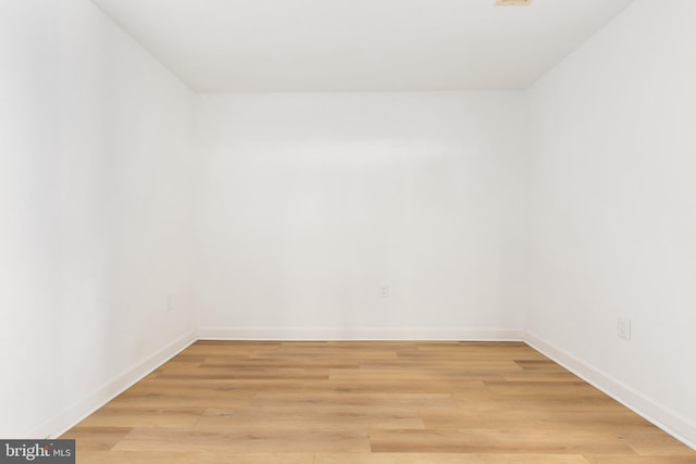 spare room featuring light hardwood / wood-style flooring