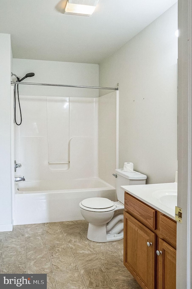 full bathroom with shower / bathing tub combination, vanity, and toilet