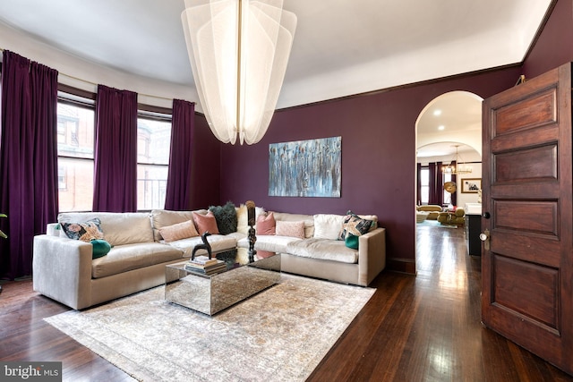 living room featuring dark wood-type flooring