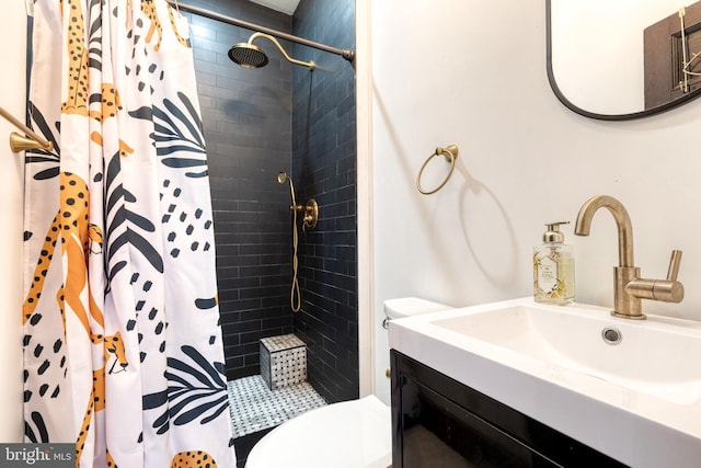 bathroom with vanity, toilet, and a shower with curtain