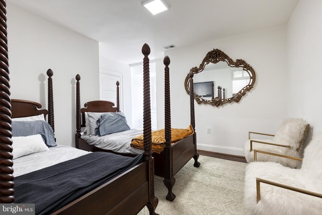 bedroom with light hardwood / wood-style flooring