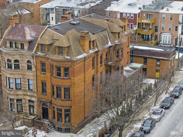 view of snow covered property