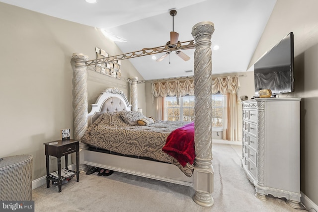 carpeted bedroom with vaulted ceiling and ceiling fan