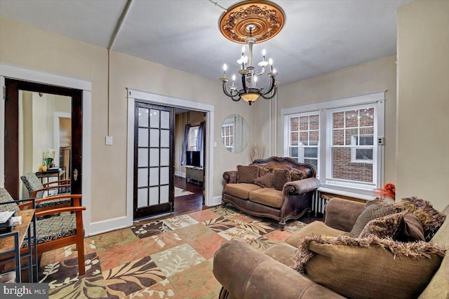 living room featuring an inviting chandelier