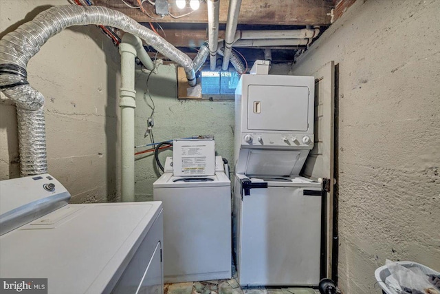 clothes washing area featuring washing machine and clothes dryer