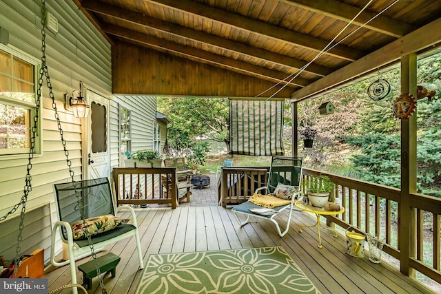 deck with an outdoor fire pit