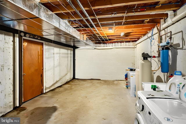 basement featuring washer and dryer