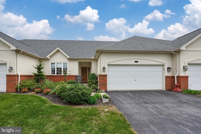 ranch-style house featuring a garage