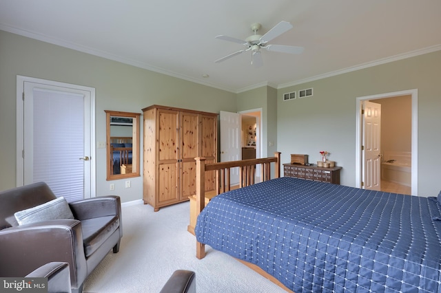 bedroom featuring ceiling fan, ensuite bathroom, light carpet, and ornamental molding