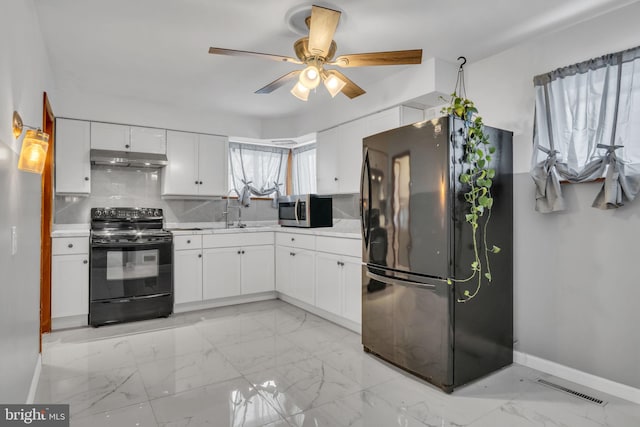 kitchen featuring backsplash, white cabinetry, ceiling fan, and black appliances