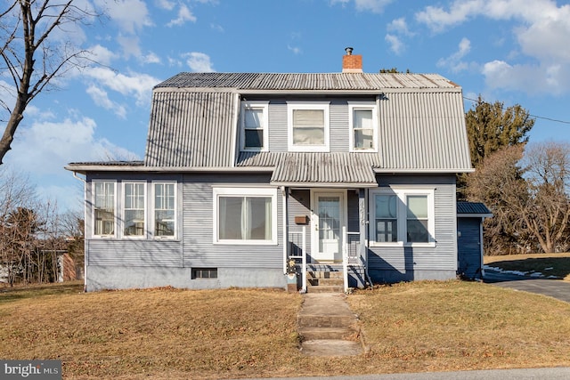 view of front of home featuring a front lawn