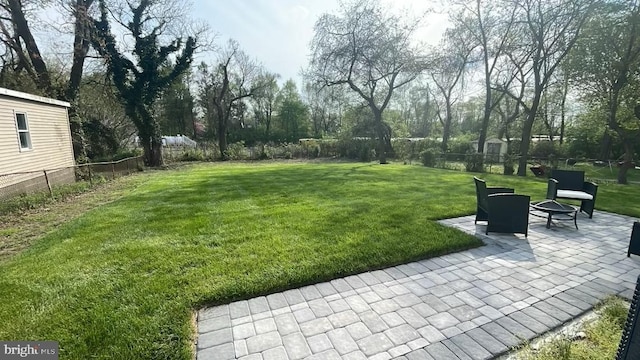 exterior space featuring a fire pit and a patio