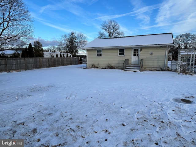 view of snow covered property