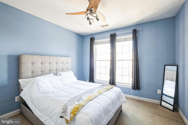 carpeted bedroom featuring ceiling fan