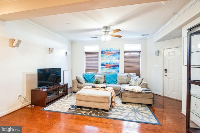 living room with ceiling fan, crown molding, and dark hardwood / wood-style flooring