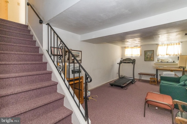 exercise area with carpet floors