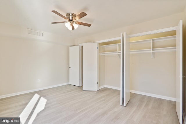 unfurnished bedroom featuring ceiling fan and light hardwood / wood-style floors