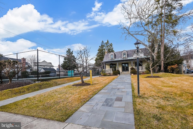 exterior space with a lawn