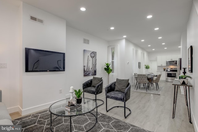 living room featuring light hardwood / wood-style flooring