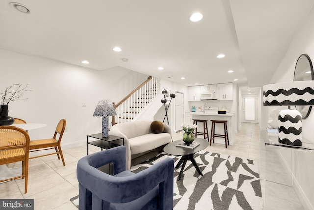 living room featuring light tile patterned flooring