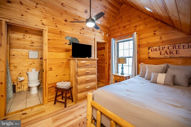 bedroom featuring ceiling fan, light hardwood / wood-style flooring, wood ceiling, and vaulted ceiling