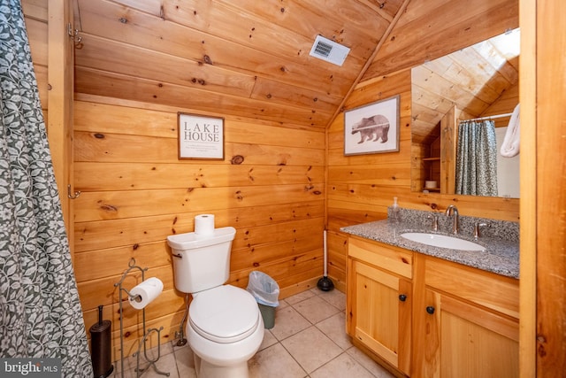 bathroom featuring tile patterned flooring, wooden walls, toilet, vaulted ceiling, and wooden ceiling