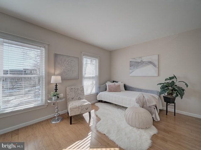 bedroom with light hardwood / wood-style flooring