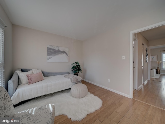 bedroom with light hardwood / wood-style flooring