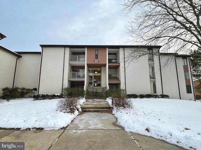 view of snow covered building