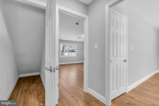 corridor featuring hardwood / wood-style flooring