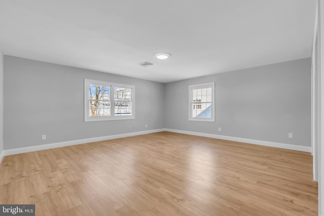 empty room featuring light hardwood / wood-style floors